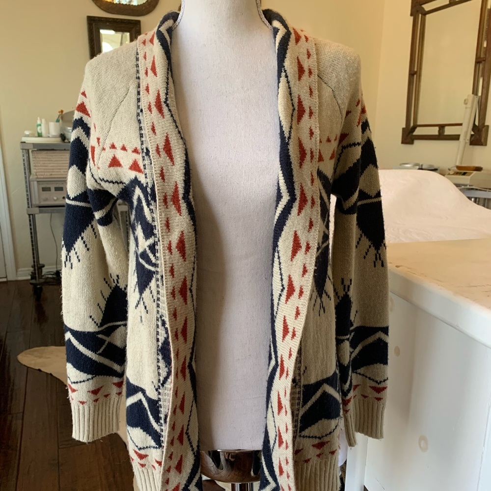 Cream, rust and navy mid length cardigan sweater